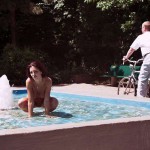 At a fountain next to a street