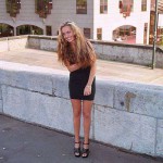 At one end of a railway bridge