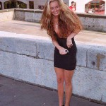 At one end of a railway bridge