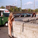 At one end of a railway bridge