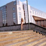 At one end of a railway bridge