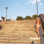 At one end of a railway bridge