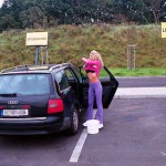 At a big gas station with a car wash