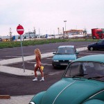 At a big gas station with a car wash