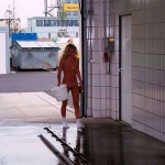 At a big gas station with a car wash