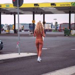 At a big gas station with a car wash