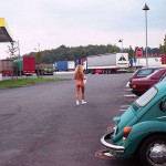 At a big gas station with a car wash