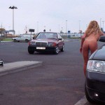 At a big gas station with a car wash