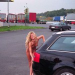 At a big gas station with a car wash