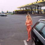 At a big gas station with a car wash