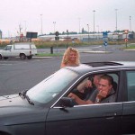 At a big gas station with a car wash