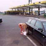 At a big gas station with a car wash