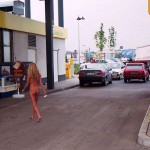 At a big gas station with a car wash