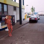 At a big gas station with a car wash