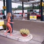 At a big gas station with a car wash