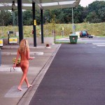 At a big gas station with a car wash