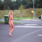 At a big gas station with a car wash