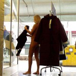 In a clothing store and the shop