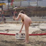 Handing out beer at a construction