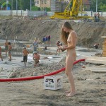 Handing out beer at a construction