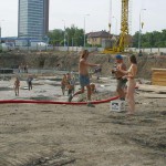 Handing out beer at a construction