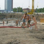 Handing out beer at a construction