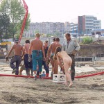 Handing out beer at a construction