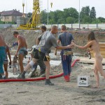 Handing out beer at a construction