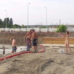 Handing out beer at a construction