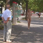 At a kiosk and in front of a street