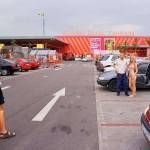 At a parking lot a building center