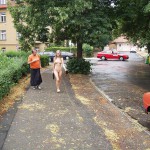 On the street interacting with tourists