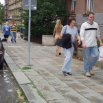 On the street interacting with tourists