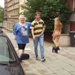 On the street interacting with tourists