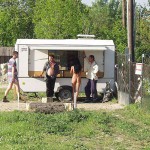 At a kiosk next to the road