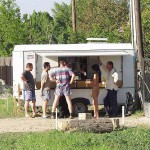 At a kiosk next to the road