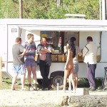 At a kiosk next to the road