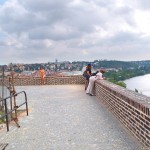 At a castle with many tourists