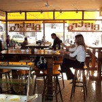 In a bistro with a big window