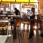 In a bistro with a big window