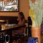 In a bistro with a big window