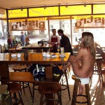 In a bistro with a big window