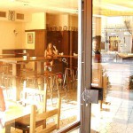 In a bistro with a big window