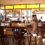 In a bistro with a big window