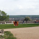 At a gas station and in a park