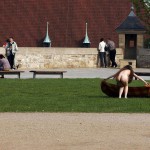 At a gas station and in a park