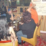 A strip game in a bar