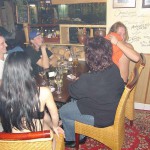 A strip game in a bar