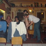 A strip game in a bar