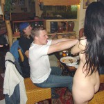 A strip game in a bar